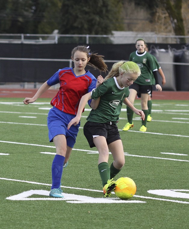 Summer Kober fights for the ball during the Sumner Explosion’s championship game against the Dynamite.