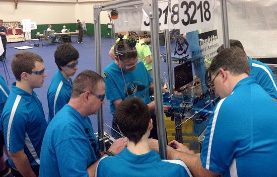 Bonney Lake Robotics makes adjustments to their robot at the Auburn Mountainview Regional competition.