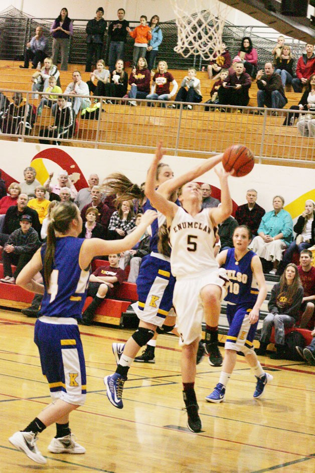 Katie Holland puts up a shot in the Enumclaw win over Kelso in the district tournament Feb. 18.