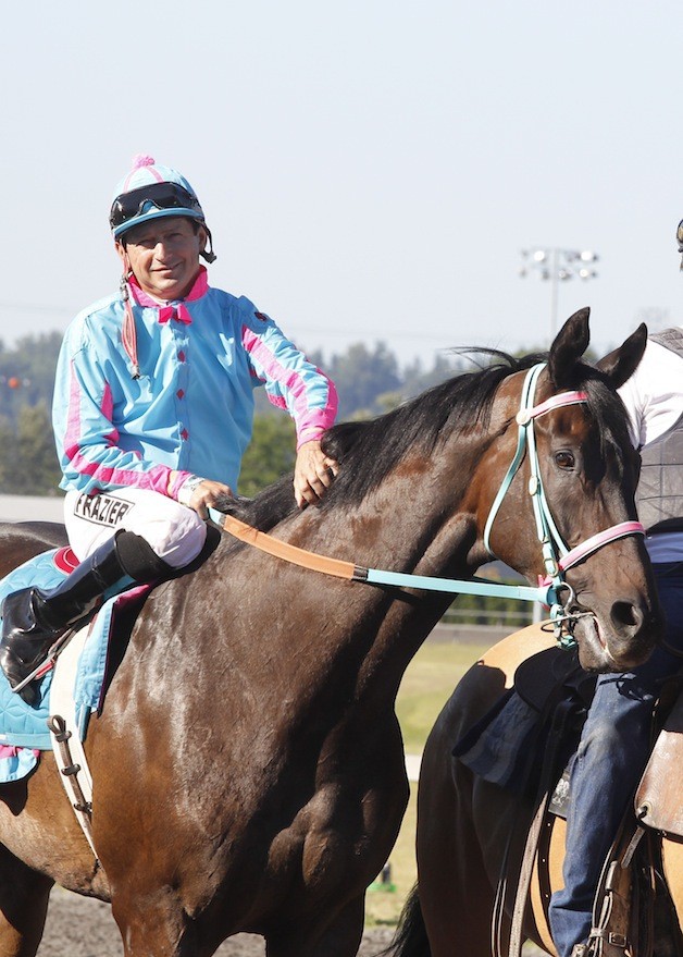 Ricky Frazier aboard Noosa Beach one last time at Emerald Downs. July 3