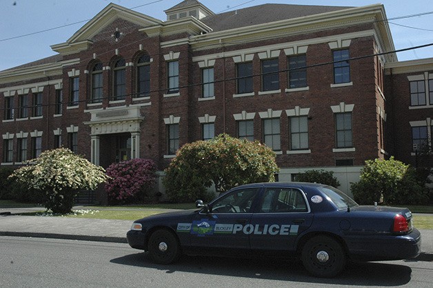 A Buckley Police car sits outside the White River School District's Administration office.