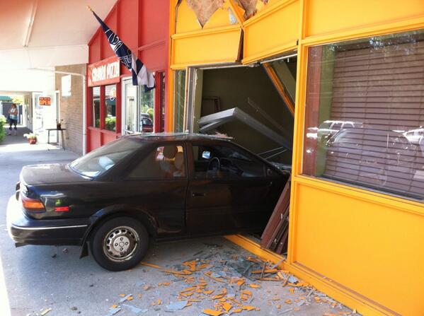 Mountain View fire on scene of a car into a building in Black Diamond.