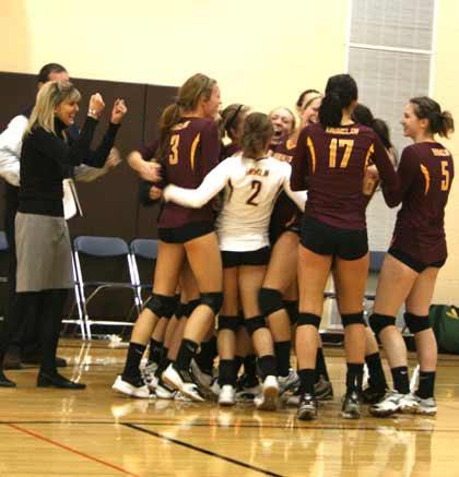 Enumclaw High celebrates its move into the state volleyball tournament as the district's No. 6 seed.