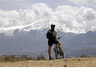 Enumclaw photographer Lisa Parsons overlooking the Cordillera Blanca around the mountain town of Haurez where she was mountain biking.