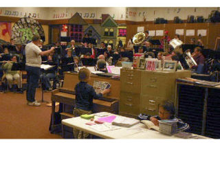 Gateway Concert Band paired up with middle school musicians for some practice time that held rewards for both groups.