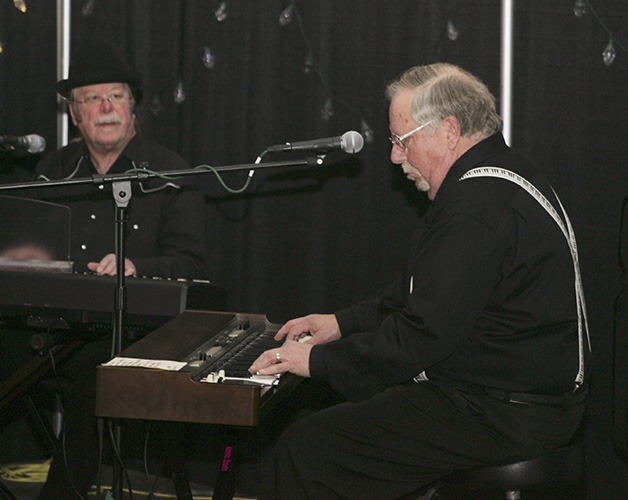 Craig Gammon and JC Rieck perform at the Wine and Chocolate Festival at the Expo Center Feb. 8.
