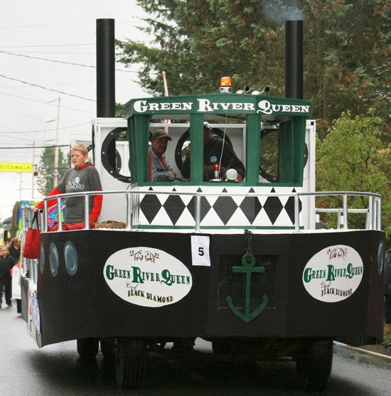 Gomer Evans pilots the Green River Queen float in the Black Diamond Labor Day parade.