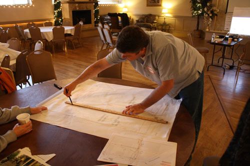 Duncan Chalmers begins his sketch of the Main Street alleyway—between BerryLand Cafe and The Alley on Main—during the Pomegranate Center planning meeting at the Hansen Place.