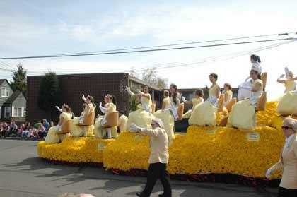 The Daffodil Princesses make their way down Main Street in Sumner.