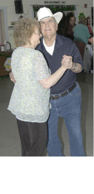 Frank Blasquez and Sybil Jennings (left) dance March 14 at the Bonney Lake Senior Center. About 50 people