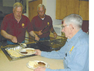 Enumclaw Lions Club members took over the senior/community center Saturday morning