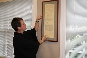 Mayor Liz Reynolds reads the city's official incorporation document