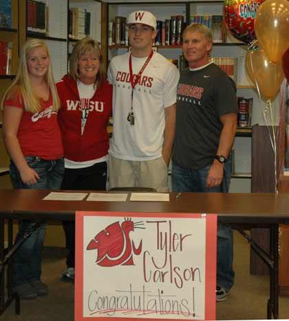 Tyler Carlson and his family celebrated his decision to play baseball at Washington State University Wednesday.