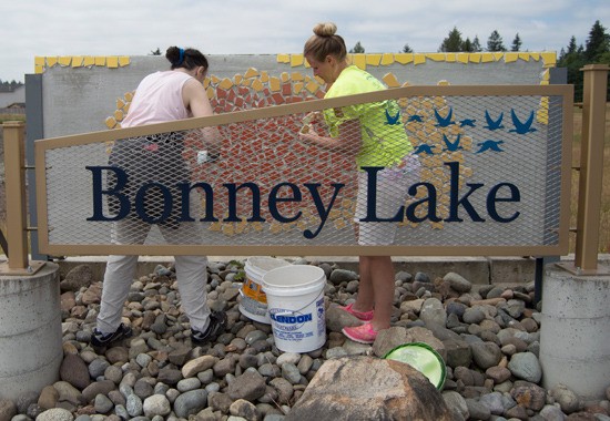 Beautify Bonney Lake and the city of Bonney Lake's Art Commission volunteers helped put up a mosaic behind the east entrance sign into the city.