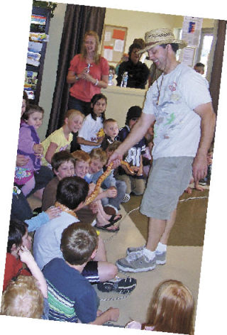 The Buckley Youth Activity Center kicked off its summer program with a Summer Fun Day featuring Reptile Guy Thursday. Kids got to get up close and personal with snakes and other creatures. The next Summer Fun Day is scheduled for 1 p.m. Thursday with Professor Bamboozle and his magic act.