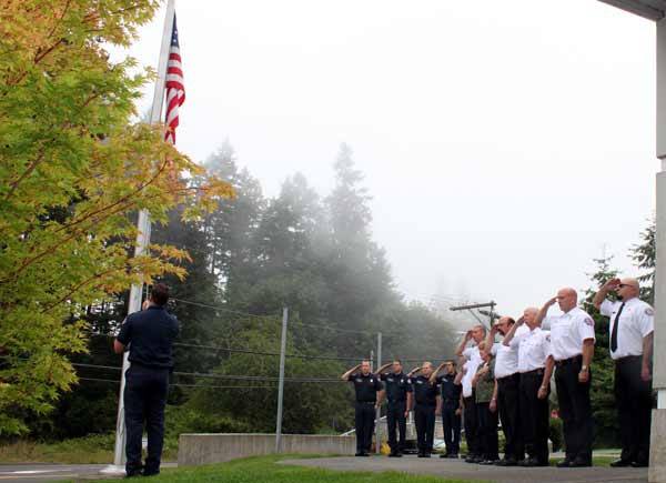 Members of East Pierce Fire and Rescue honor former Chief Dan Packer's memory on the fourth anniversary of his death