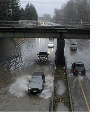 The rainstorm hit Jan. 6 and by noon Jan. 7 state Route 410 between Traffic and Valley avenues was closed due to water over the road. Rainier Manor and  River Park flooded when the Puyallup River breached its banks.