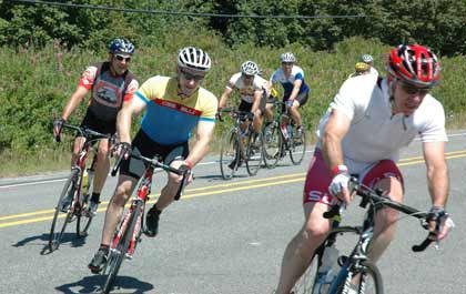 Bicyclist complete the final leg of their 154-mile Ride Around Mount Rainier in One Day July 29.
