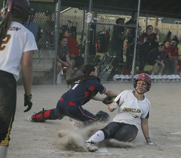 Chloe Young slides in safely for the Hornets May 16 at the sixplex against Kennedy Catholic. Enumclaw won 15-3.