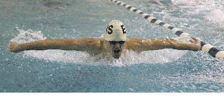 Josh Petersen sprints to a second-place finish in the 100-yard butterfly Thursday
