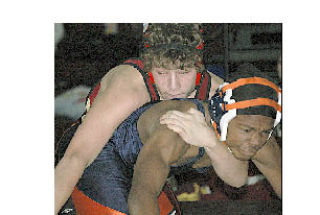 Caden Pugmire has the advantage here and later pinned his Lakes opponent Saturday.