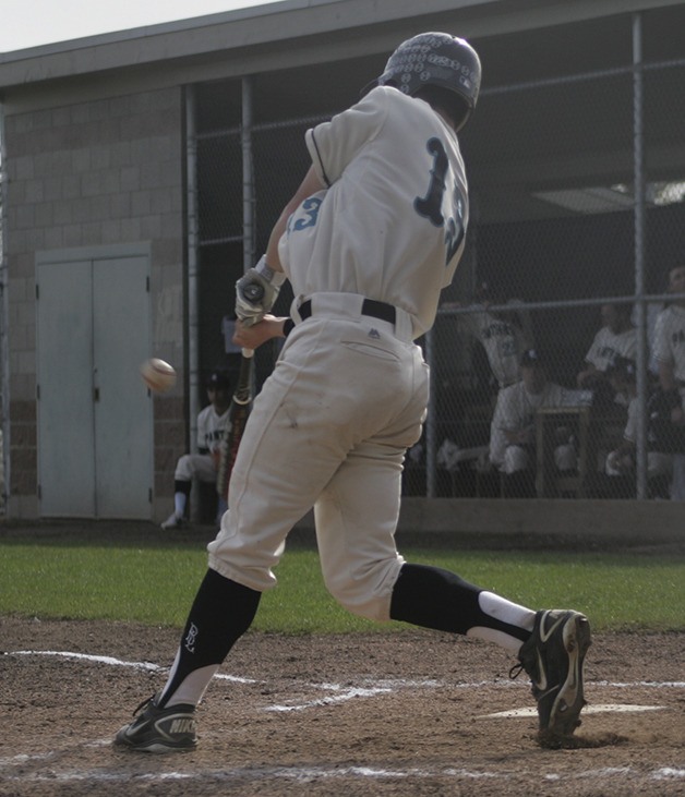 Bonney Lake senior Ryan Noborikawa swings at a pitch during the Panthers 11-2 win over Peninsula Thursday.