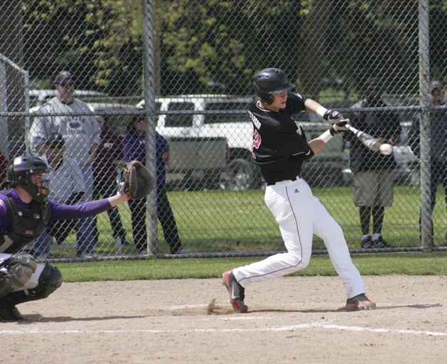 Bryce Peterson makes contact Saturday at Russell Road Park in the Enumclaw Hornets win over Highline in the SPSL subdistrict playoffs.