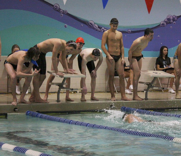 Members of the Bonney Lake 400 freestyle relay cheer on their teammate Jan. 17 versus Steilacoom.