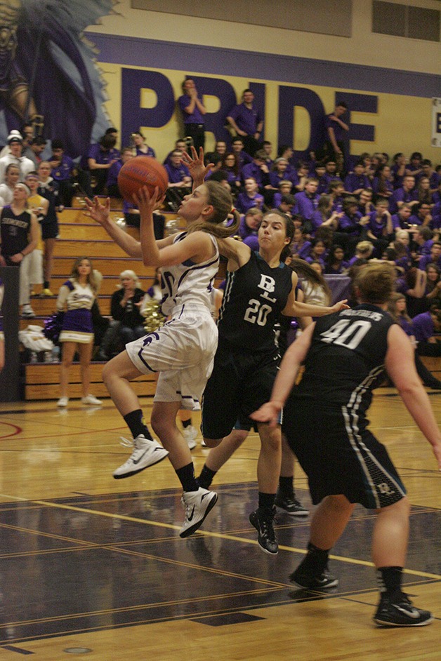 Sumner sophomore guard JaneAllyn Norris drives toward the basket during Tuesday's double header against Bonney Lake.