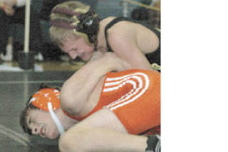 Travis Reano started the Hornets’ march Saturday night with a title at 103 pounds.