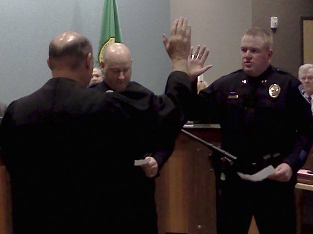 Judge Ron Heslop swears in James Keller and Kurt Alfano as Assistant Chiefs of Police to the Bonney Lake Police Department.