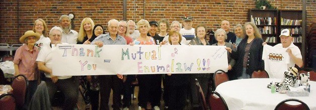 Enumclaw Senior Center participants and staff gathered recently to thank Mutual of Enumclaw for a grant award in the sum of $2