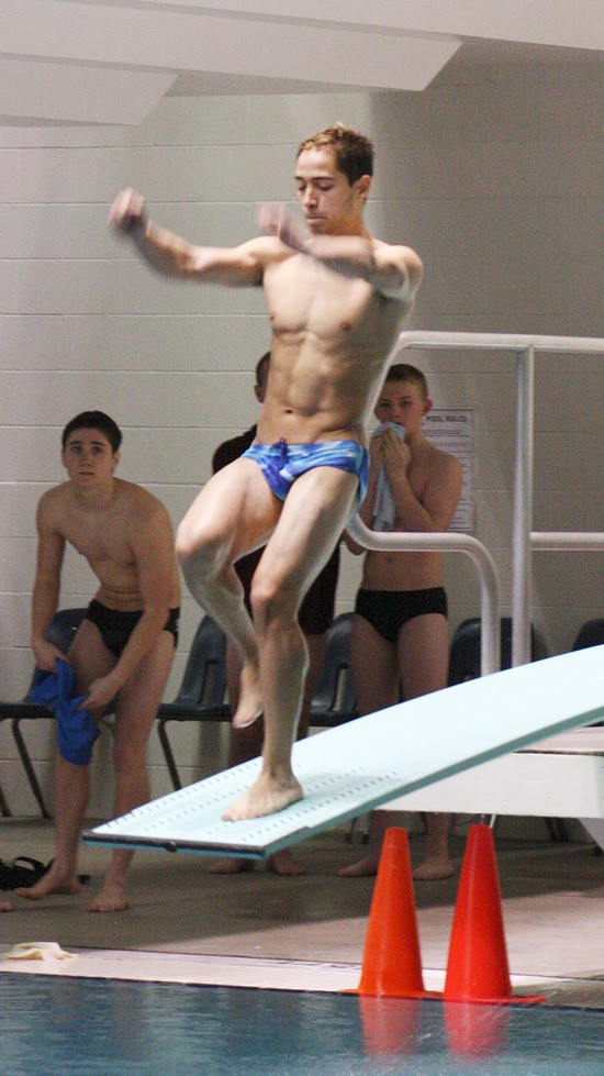 Sumner diver Rafael Rodriguez prepares a 1 1/2 somersault with two twists