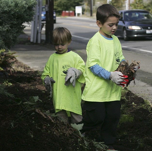Austin Goodnight and his brother Gavin participate in Beautify Bonney Lake at the Post Office.