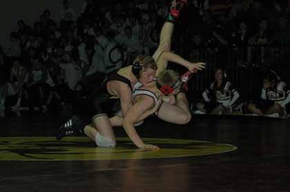 Enumclaw's Travis Reano and White River's Caleb Maurseth do battle during nonleague wrestling action Wednesday in Buckley.