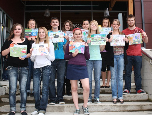 The winners of the 2013 Stormwater Calendar contest display their art at the Justice Center