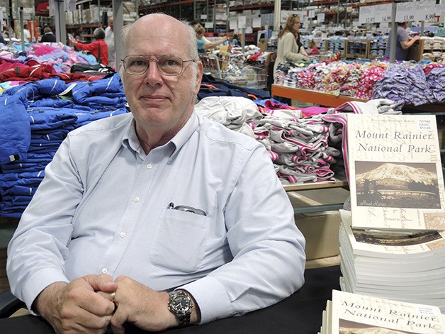 Donald Johnstone signed copies of his book 'Mount Rainier National Park' at Costco Saturday. The book was published by Arcadia in the Postcard History series.