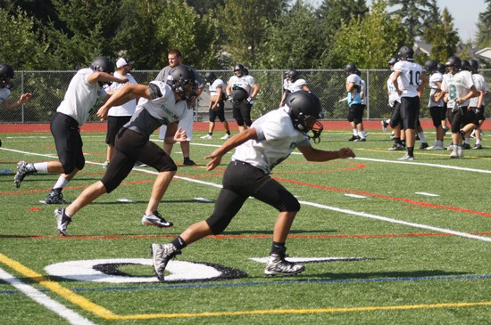 The Bonney Lake Panthers run through a kickoff drill during practice last week on the BLHS campus.