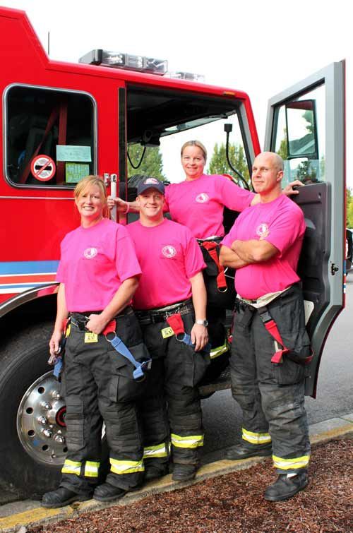 Members of east Pierce Fire and Rescue in their pink shirts.