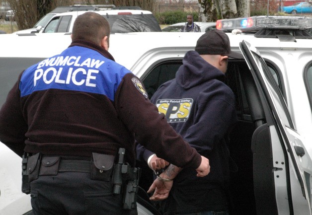 Police action at the Enumclaw Library parking lot Wednesday