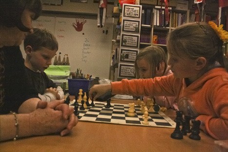 Lake Tapps Elementary students play chess after school. The chess club is one of five after-school programs designed for the purpose of extracurricular student enrichment.