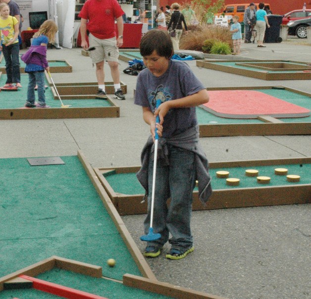 The Enumclaw Rotary mini golf course was a big hit at the Street Fair Friday.