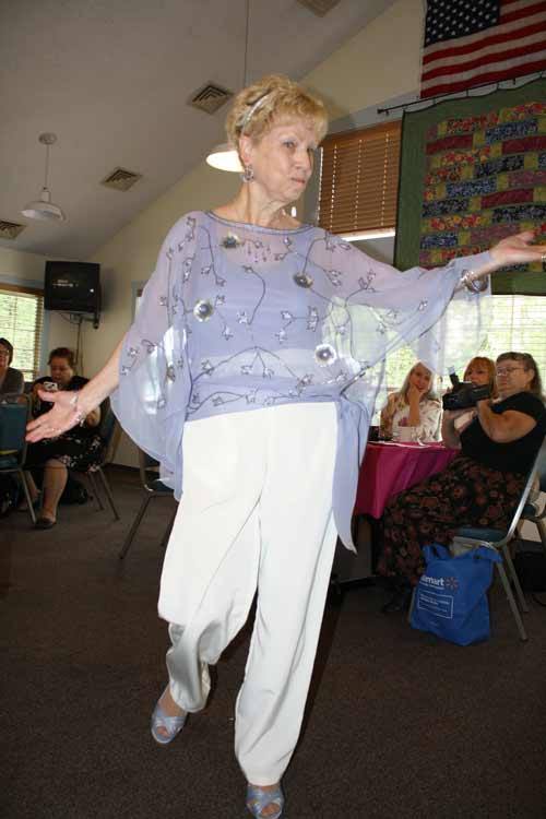 Betty Filsmyer struts her stuff during the Bonney Lake Senior Center's fashion show July 15.