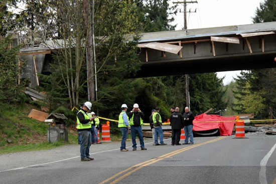 Construction crews and Bonney Lake police examine the overpass for any additional safety hazards.