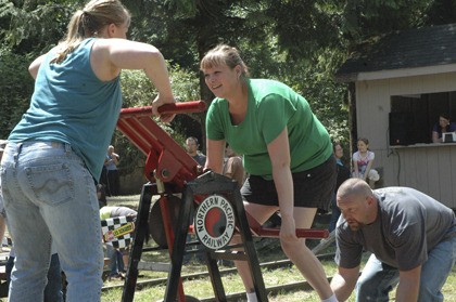 Competitors sent their handcars sailing down the rails during Saturday races in Wilkeson. The day