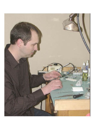 Bill Matheson uses a wax scribe in preparation for marking out wax to fit a stone.