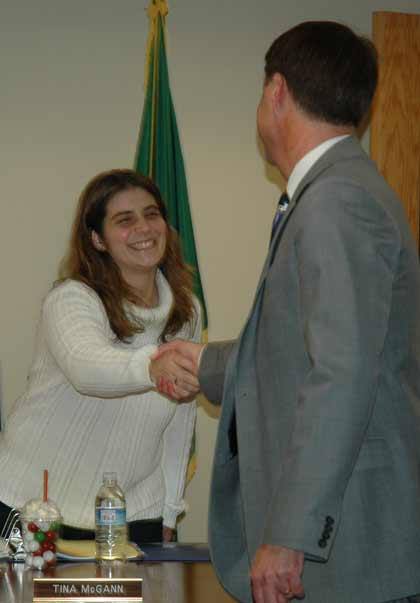 Superintendent Mike Nelson welcomes recently-elected Enumclaw School Board member Tina McGann.