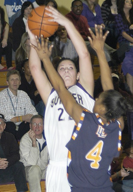 Sumner's 6-foot post Kaitlin King goes up for a jumper against Lakes Jan. 5 at home. King finished with 7 points.