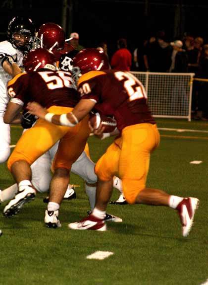 Kolton Carlson eyes a hole in the Enumclaw line Friday night against Bonney Lake.