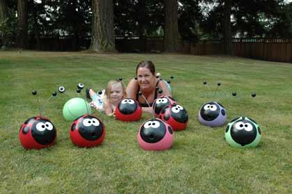 Recycled Smiles owner Claire Holder roll out a batch of lady bugs and a green frog. Holder creates the critters from used bowling balls.